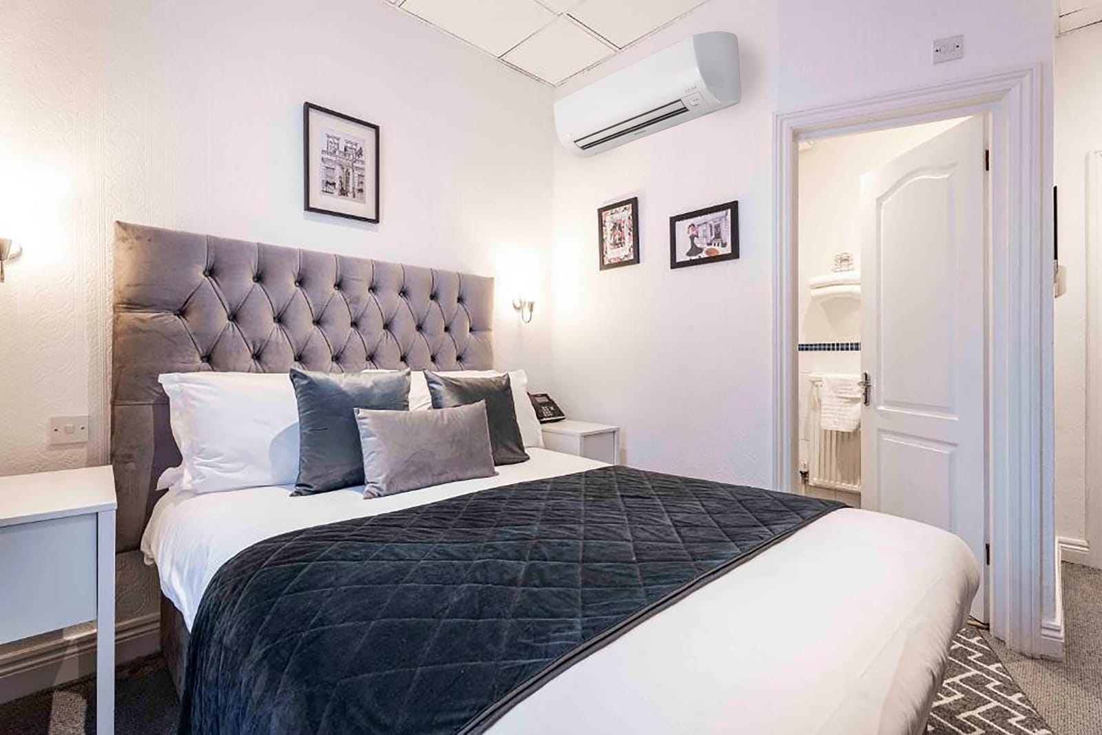 Classic Double Room at The Melita — the headboard and the bathroom beyond