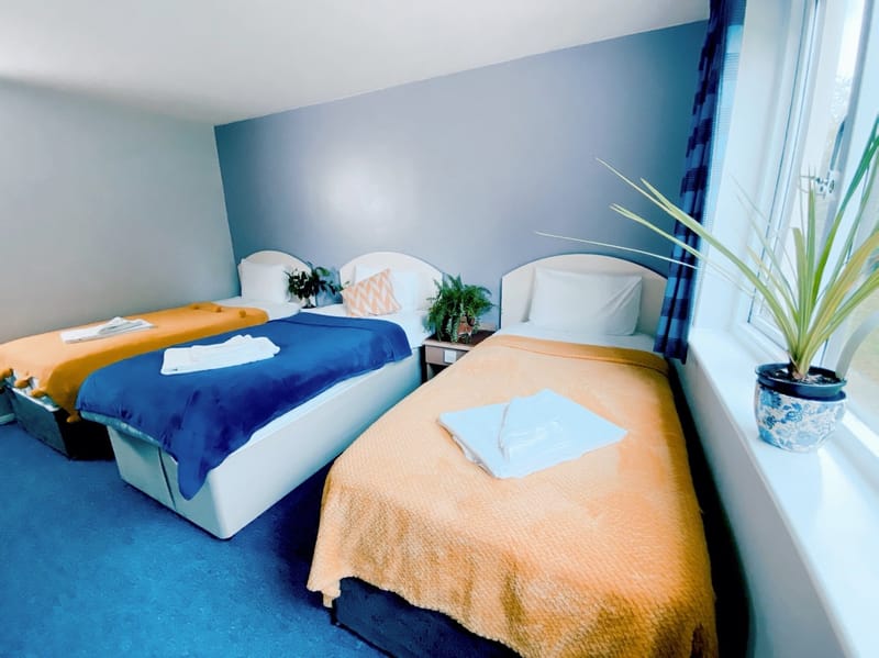 Single beds in the Triple Room