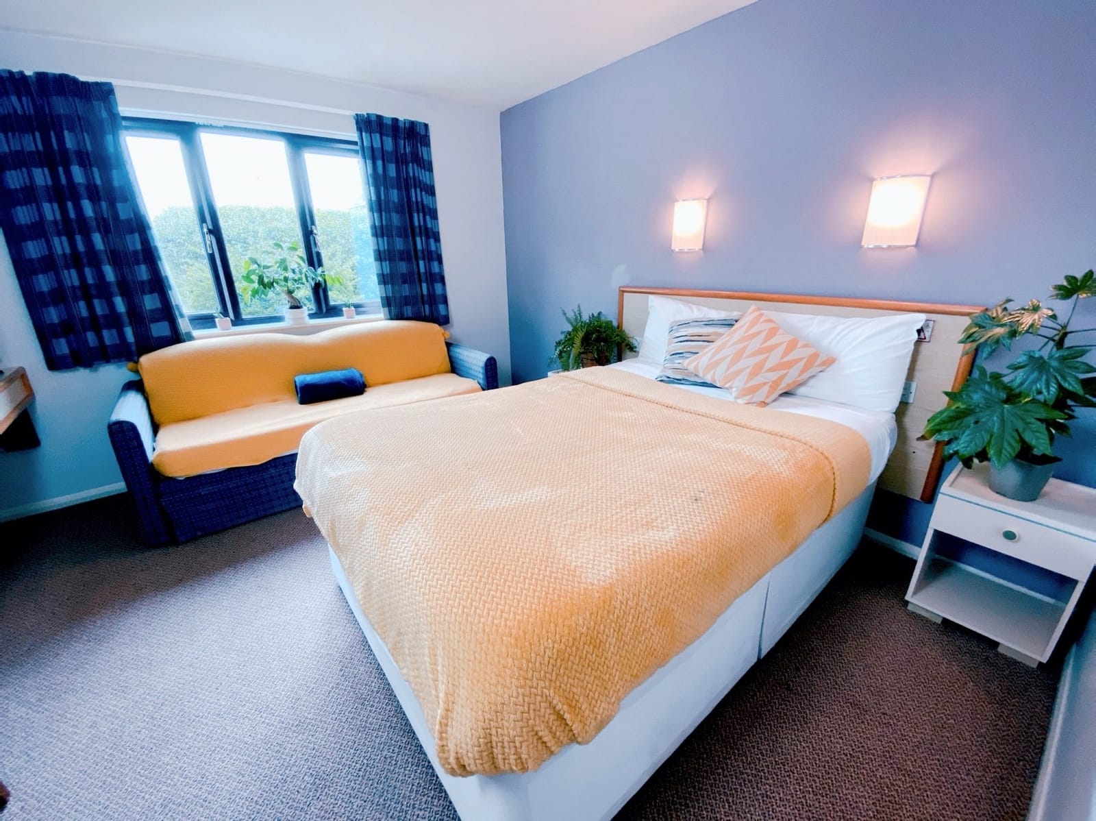 King Room with a king-size bed and a sofa bed