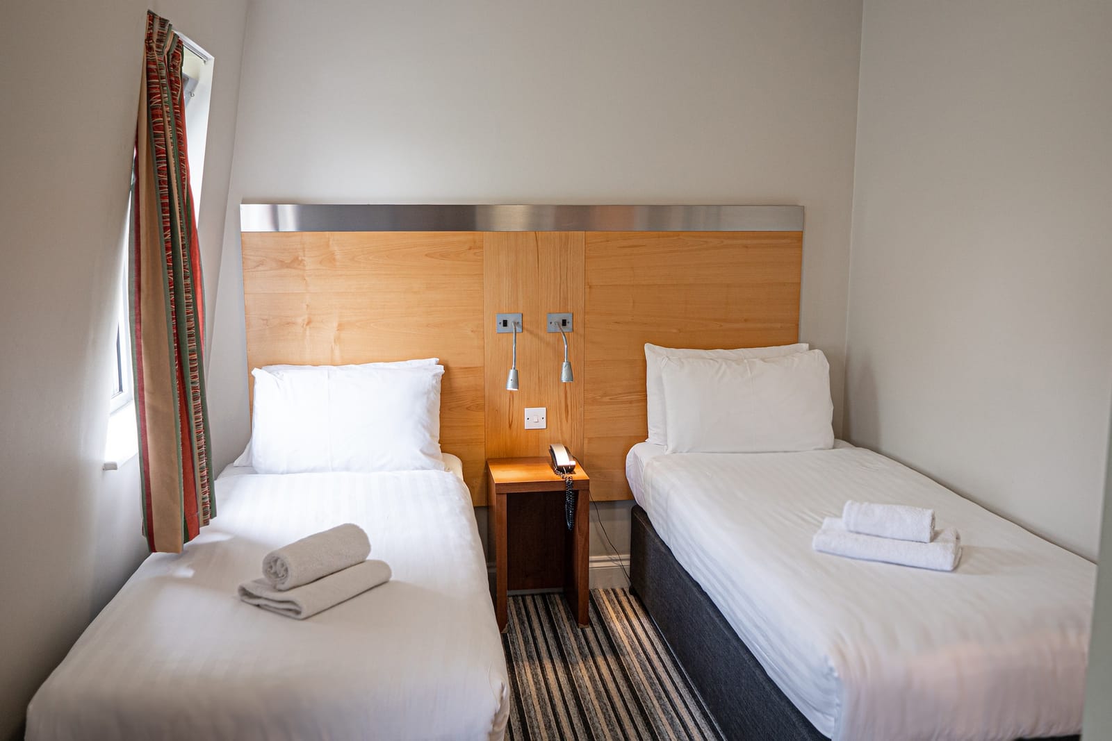 Twin room at Maiden Oval, with two single beds