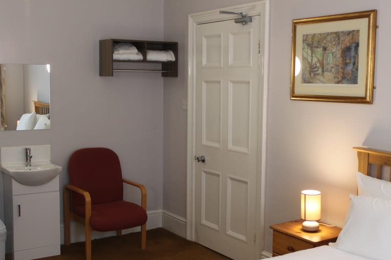 In-room wash basin and armchair