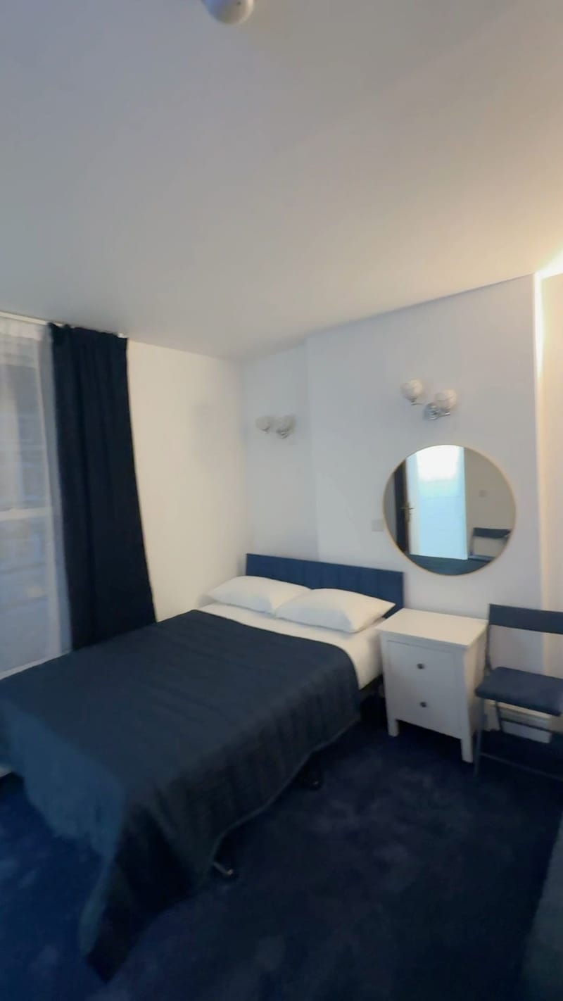 Triple Room — the double bed by the window