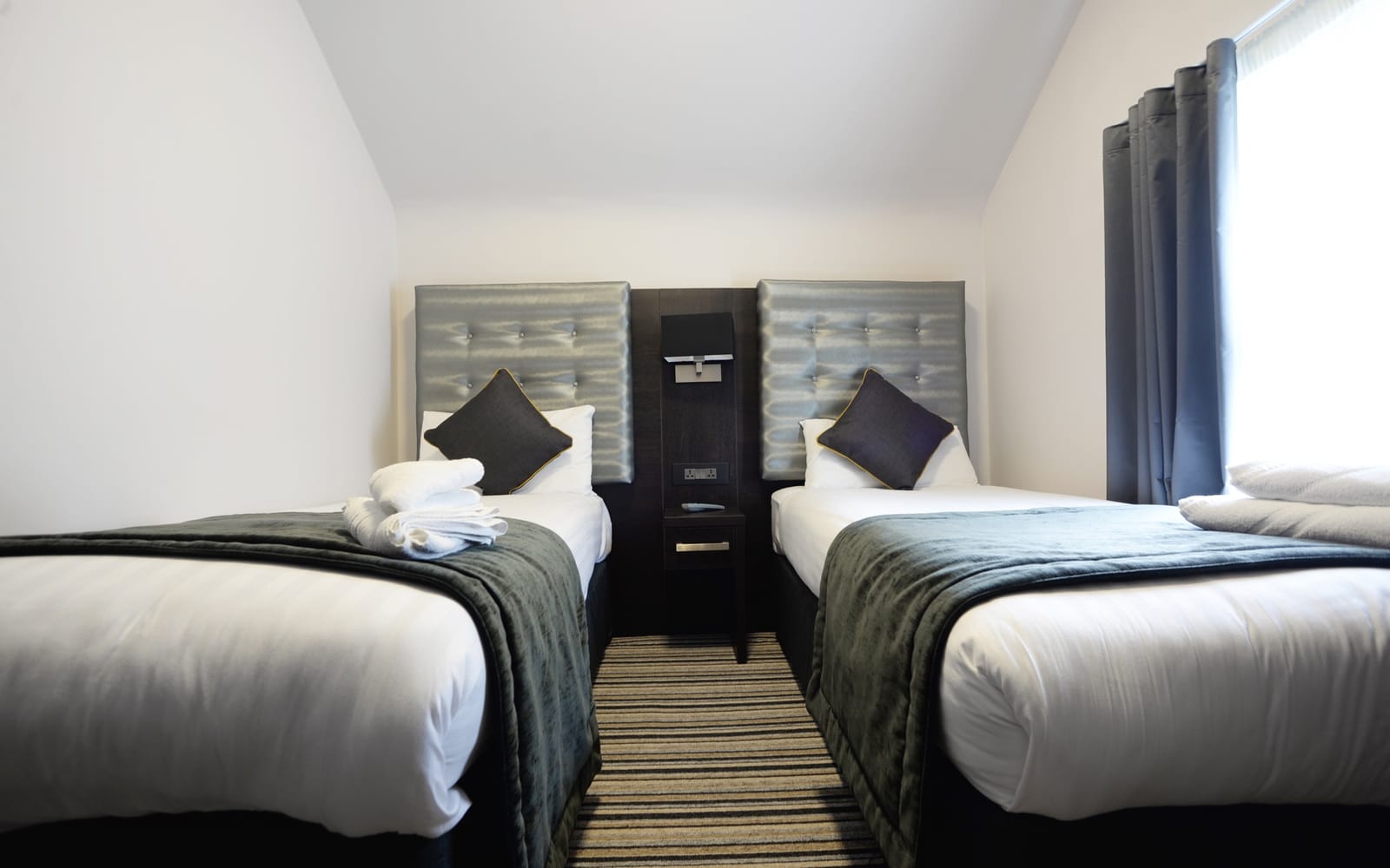 Twin room at The 29 London, with two single beds