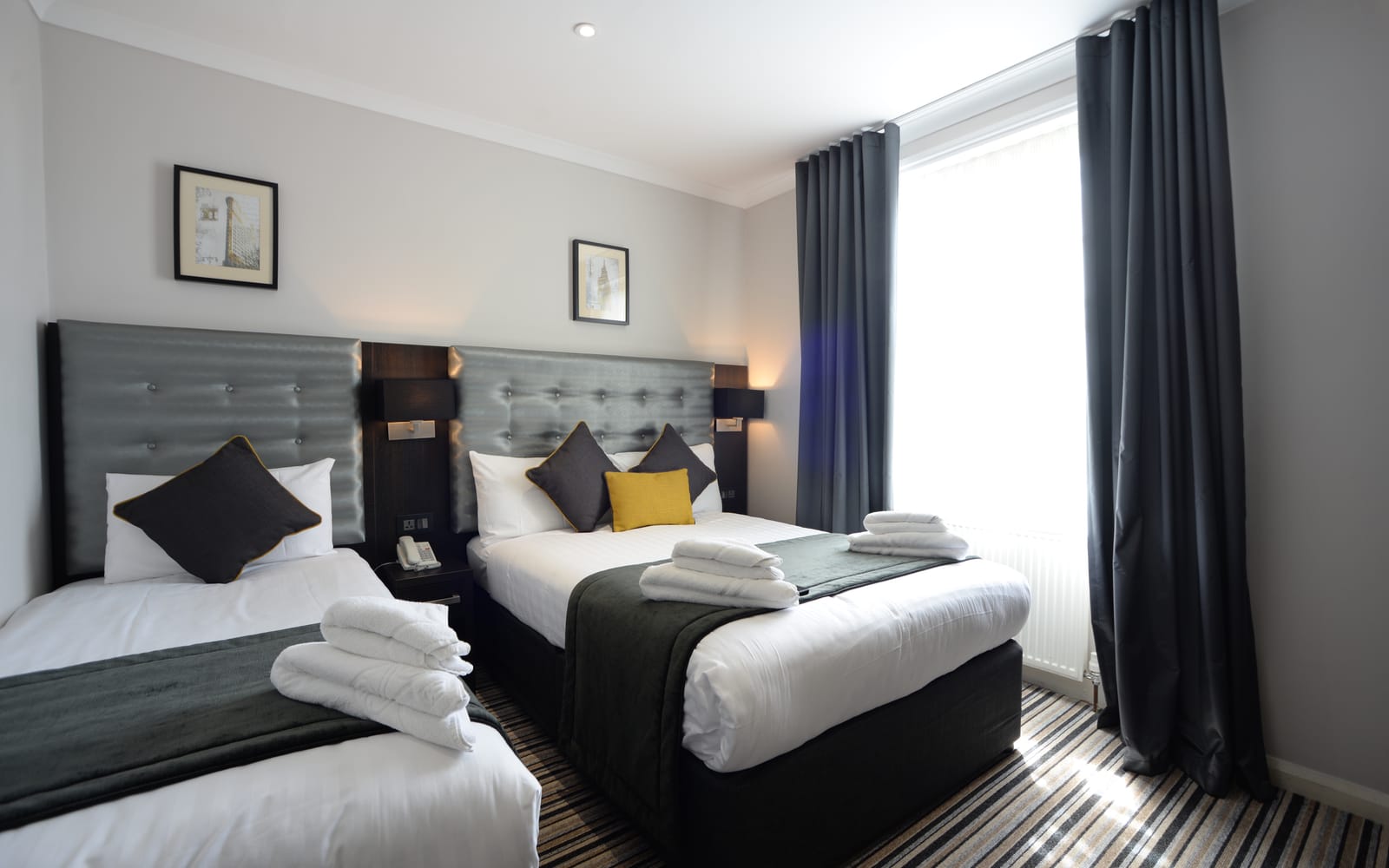 Triple room at The 29 London, with a double bed and a single bed