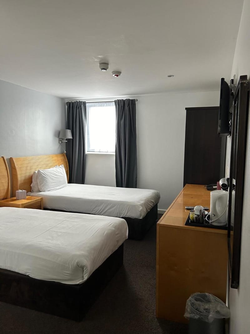 Single beds, desk and TV
