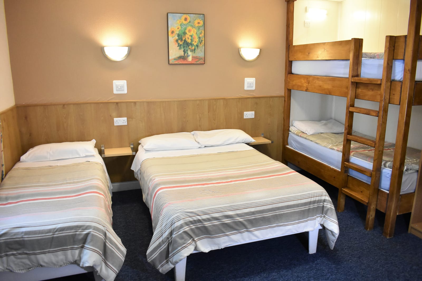 Family room for five — single beds and a bunk