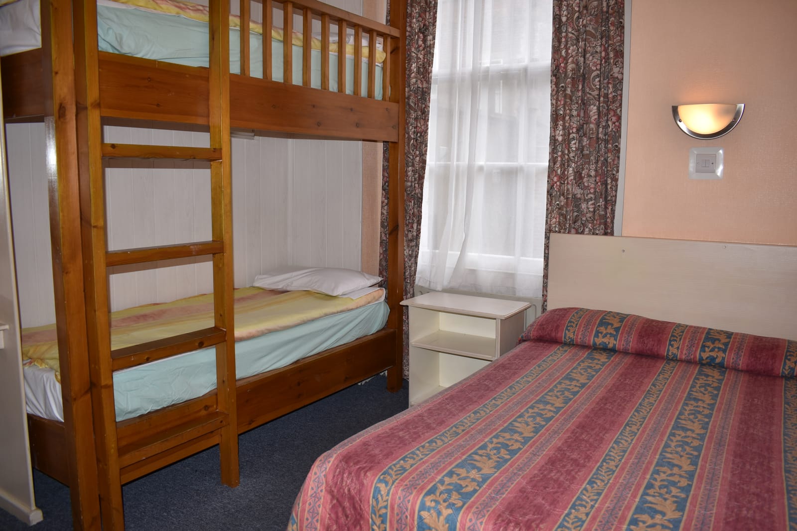 Quadruple room — a double bed and a bunk