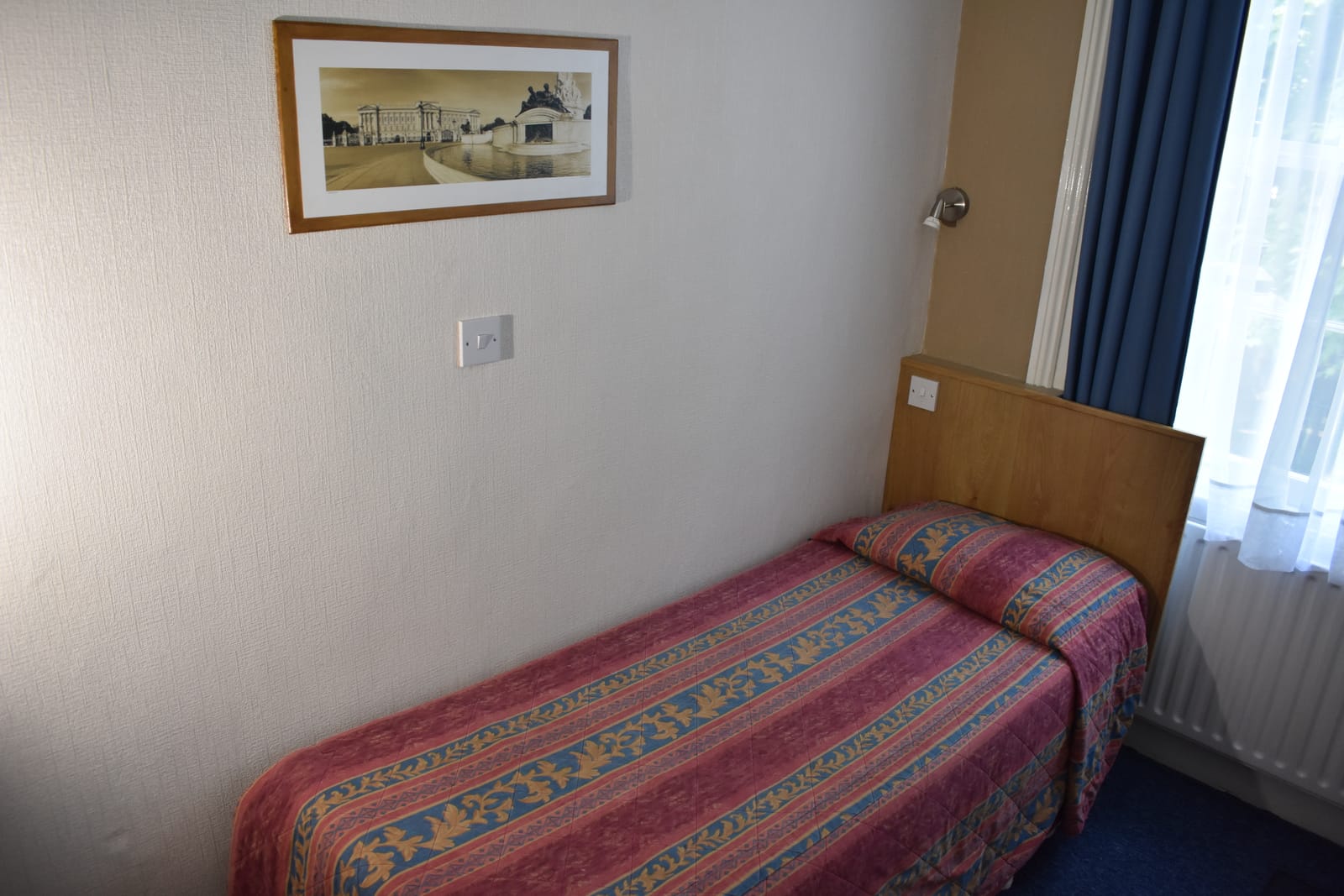 Single room with shared bathroom