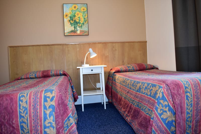 Twin room with its own bathroom
