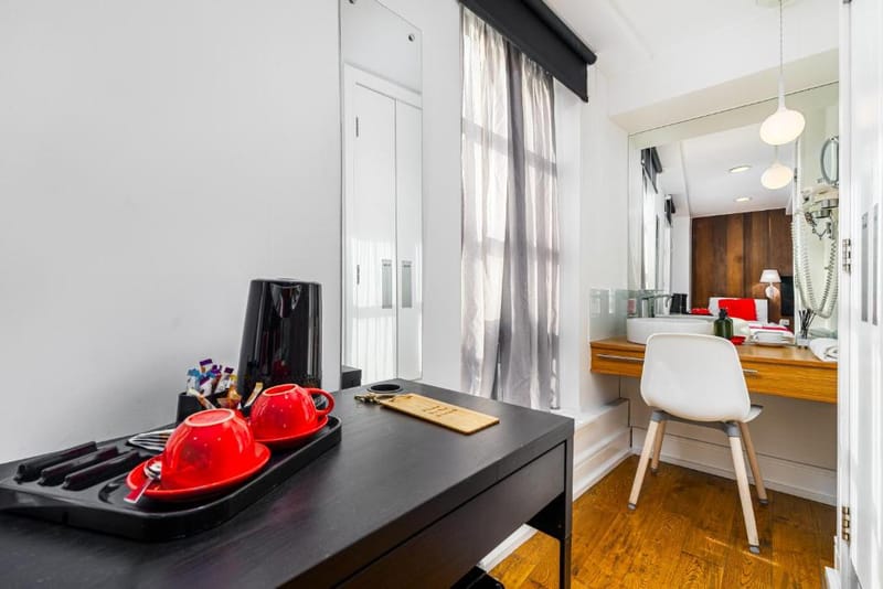 The desk and mirror in a Superior Twin Room