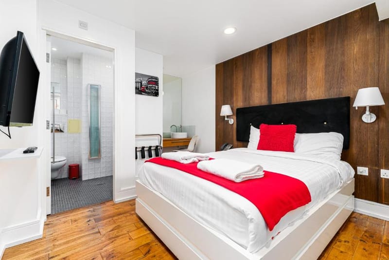 A Luxury Double Room, with the ensuite shower room beyond
