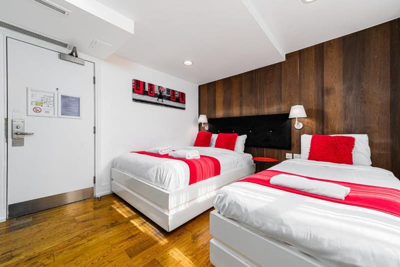 The double bed and single bed in a Classic Triple Room