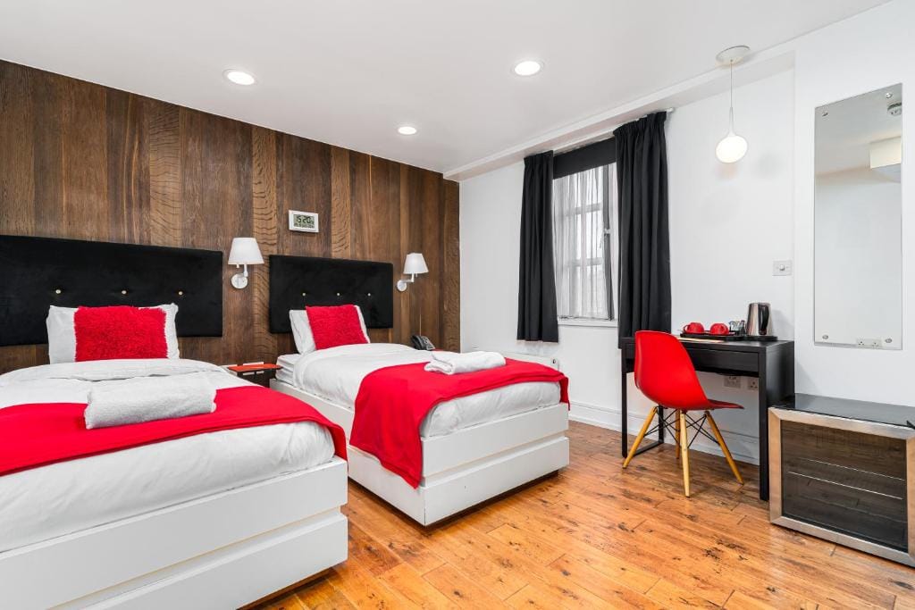 A Superior Twin Room, with two single beds and city views