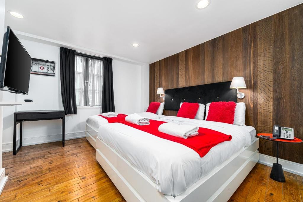 A Luxury Double Room, with an extra-large double bed on an upper floor