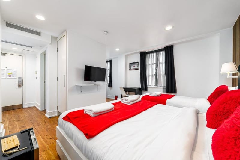 A Luxury Double Room's extra-large double bed and seating