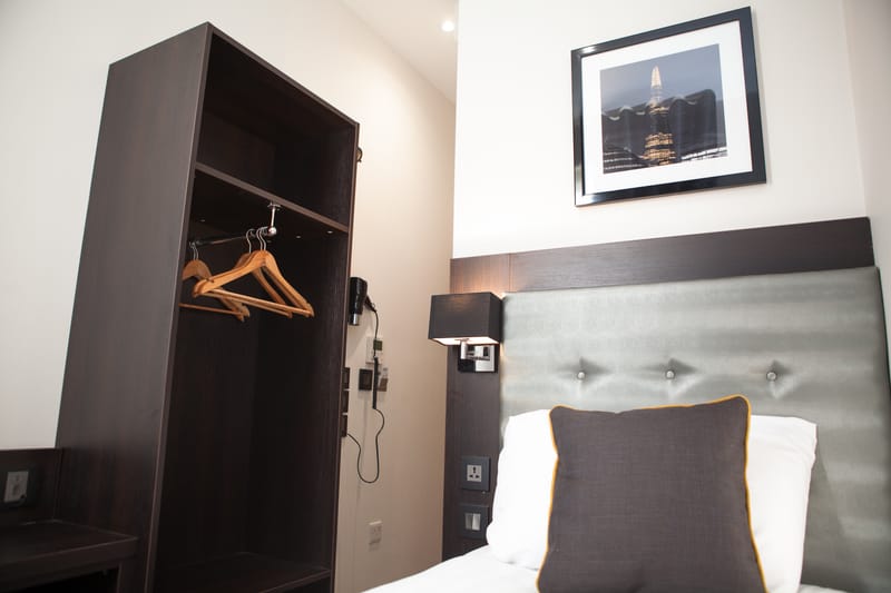 Single Room — bed and wardrobe