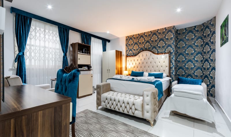 Quad Room sleeping four, with a double bed and single beds
