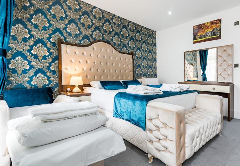 Family Room with a large double bed and two single beds