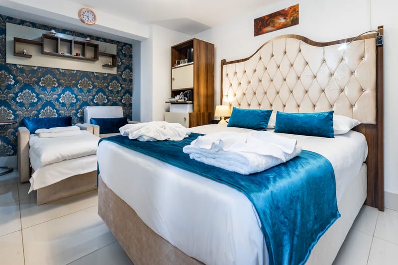 The double bed in a Quad Room