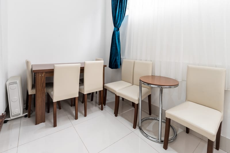 The dining table and chairs in a Family Room